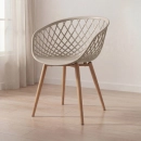 Cadeira de jantar Clarice Nest com design moderno e anatômico - Nude