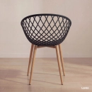 Cadeira de jantar Clarice Nest com design moderno e anatômico - Preto