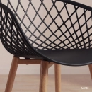 Cadeira de jantar Clarice Nest com design moderno e anatômico - Preto